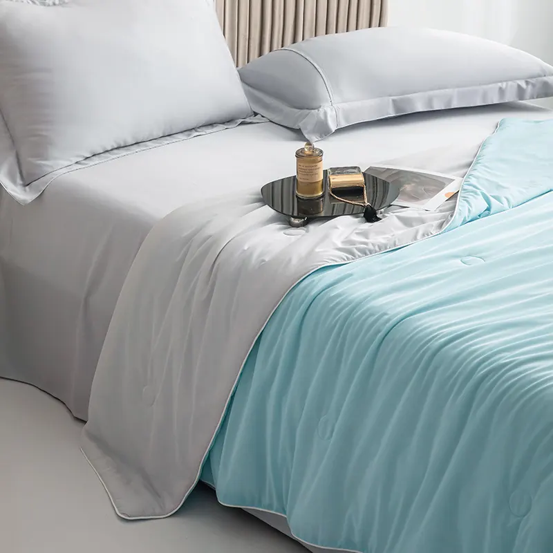Corner of the doona folded back: Sky Blue cool side on top, light grey soft side underneath